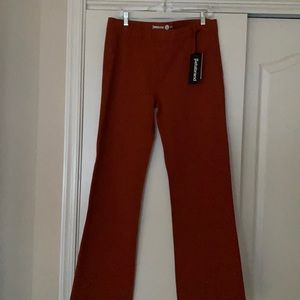 BetabrandNWT  pumpkin colored pants  . Polyester knit. Business casual.
